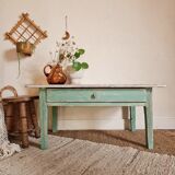 Wooden farmhouse coffee table green base