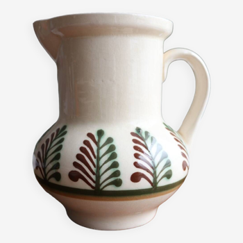 Old painted ceramic pitcher