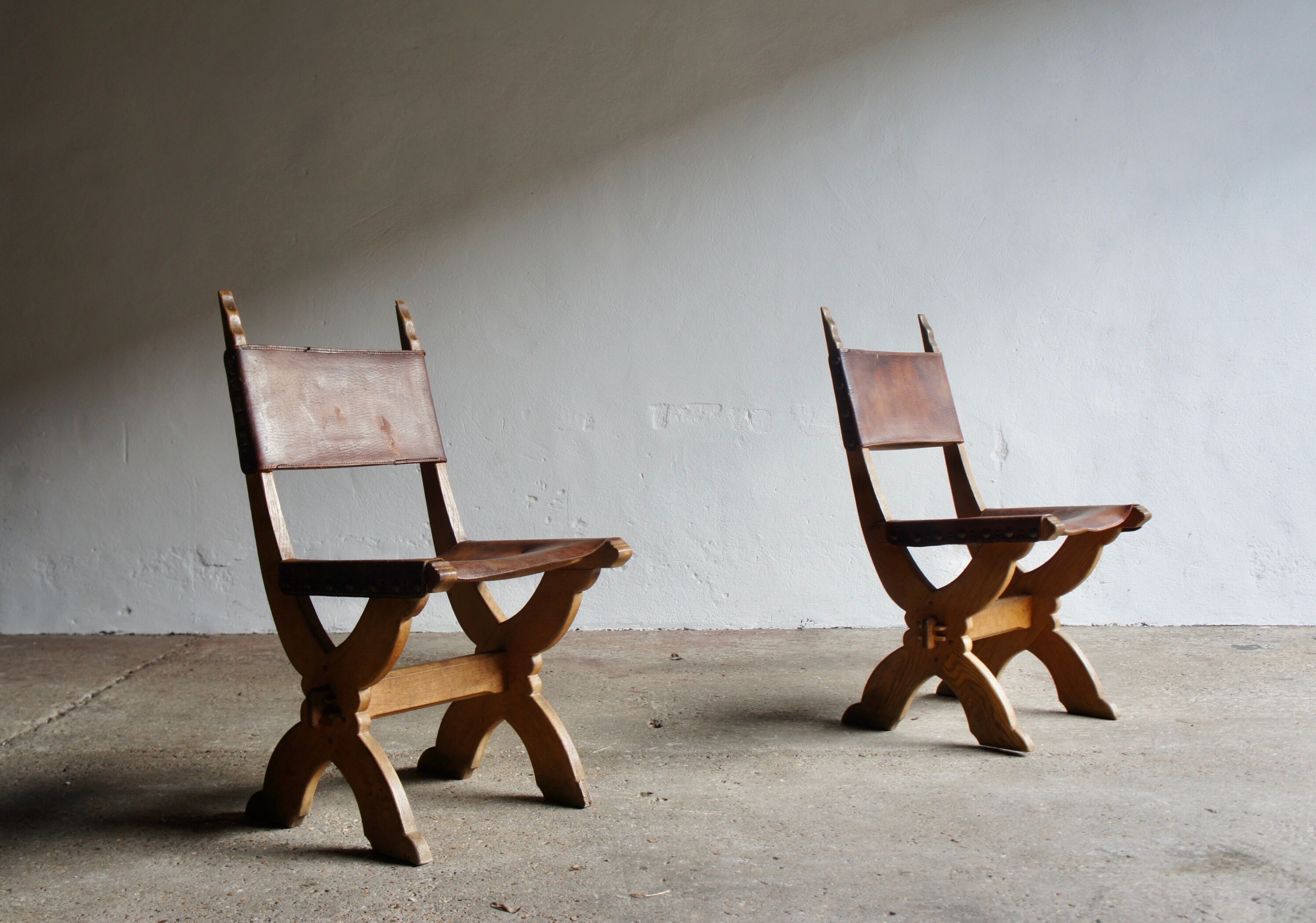 Pair of gothic style leather chairs