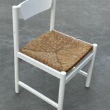 Vintage chair with wicker seat, minimalist design