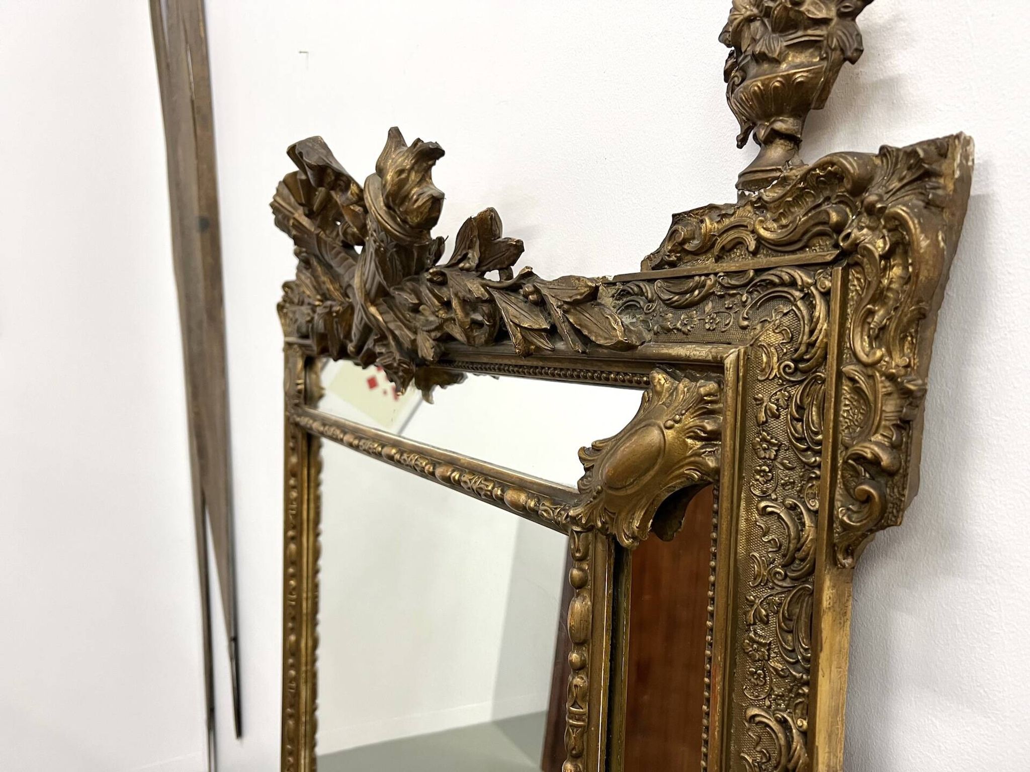 Large antique pediment mirror with mouldings.