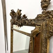Large antique pediment mirror with mouldings.