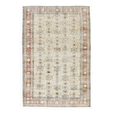 Tapis persan vintage à motif floral