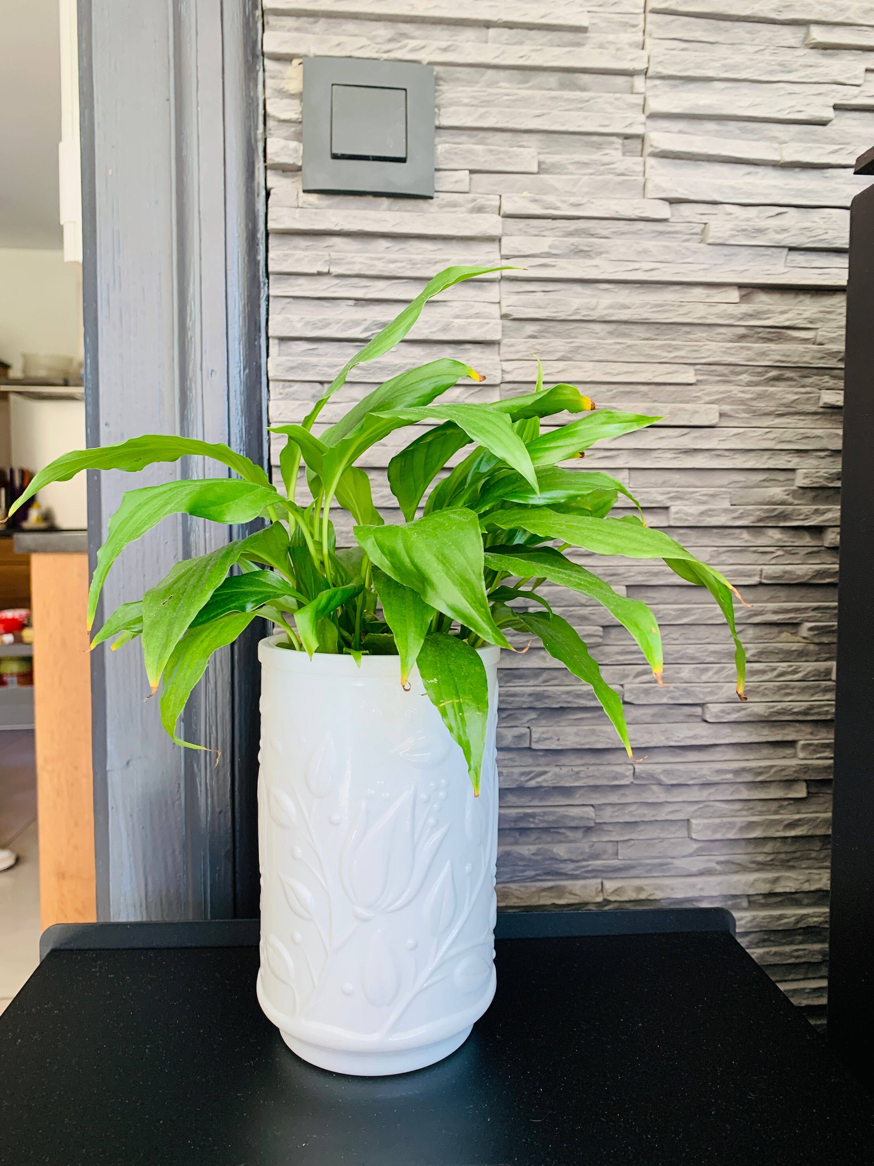 White vintage vase in opal glass