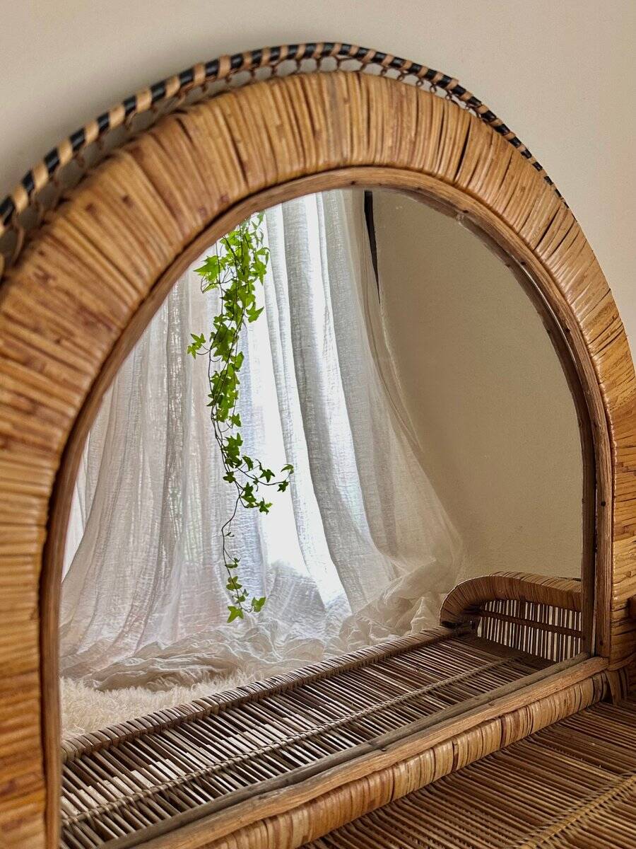 Woven rattan and wicker shelf mirror in the Emmanuelle style, Spain, 1970s.