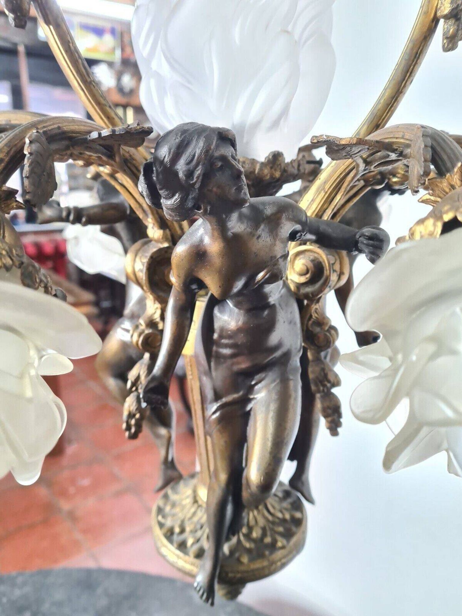 LOUIS XV style chandelier in gilded and patinated bronze with draped women