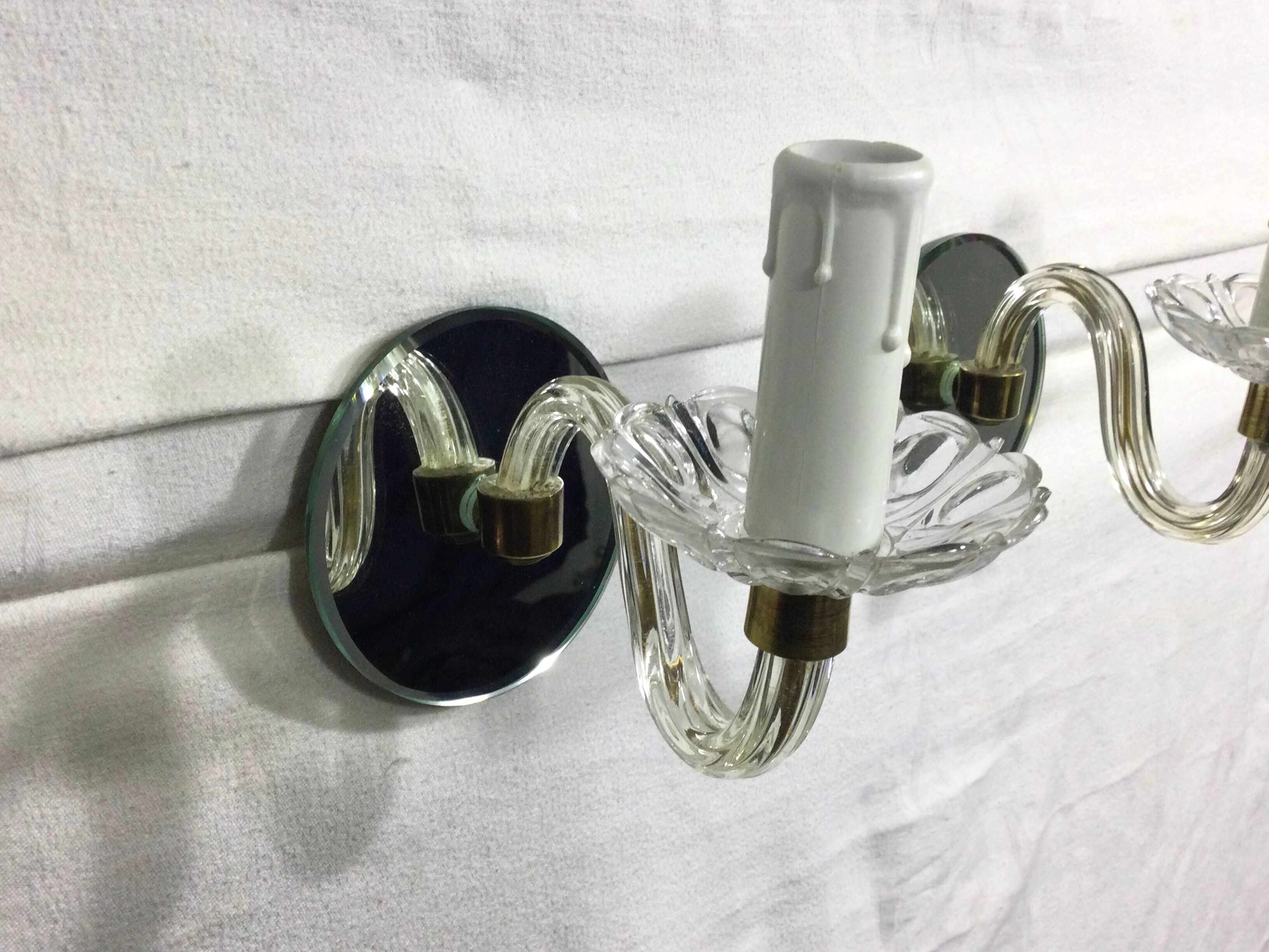 Pair of glass and mirror sconces