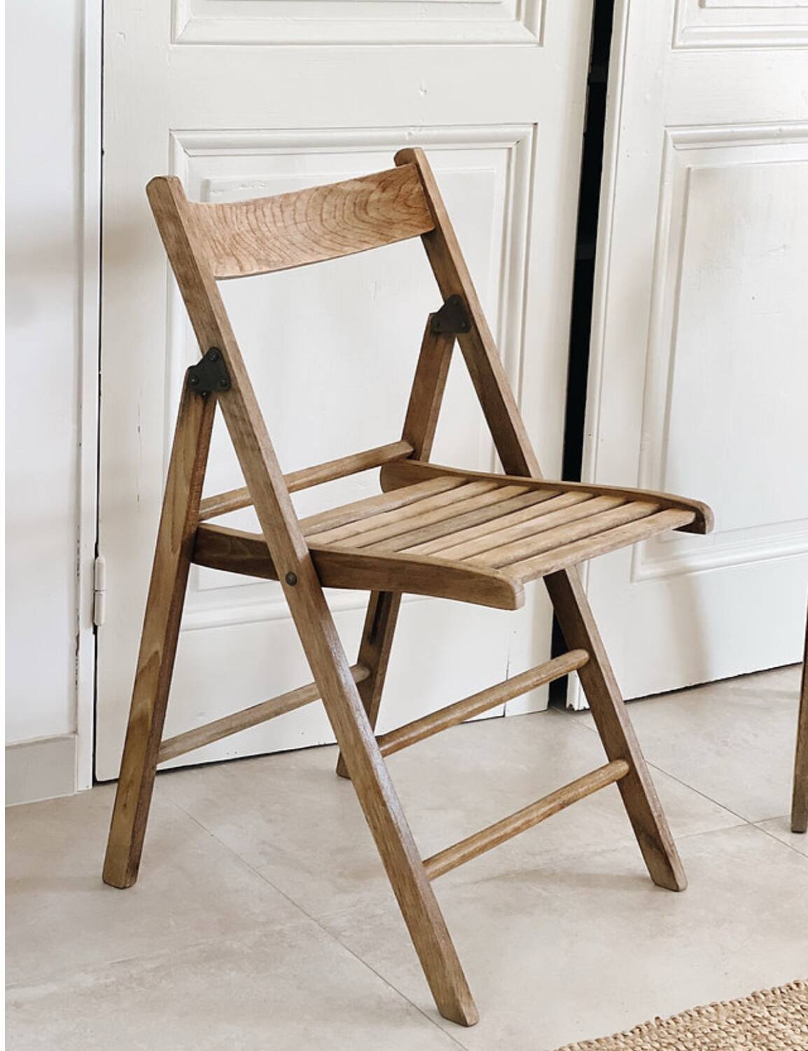 Pair of folding wooden chairs