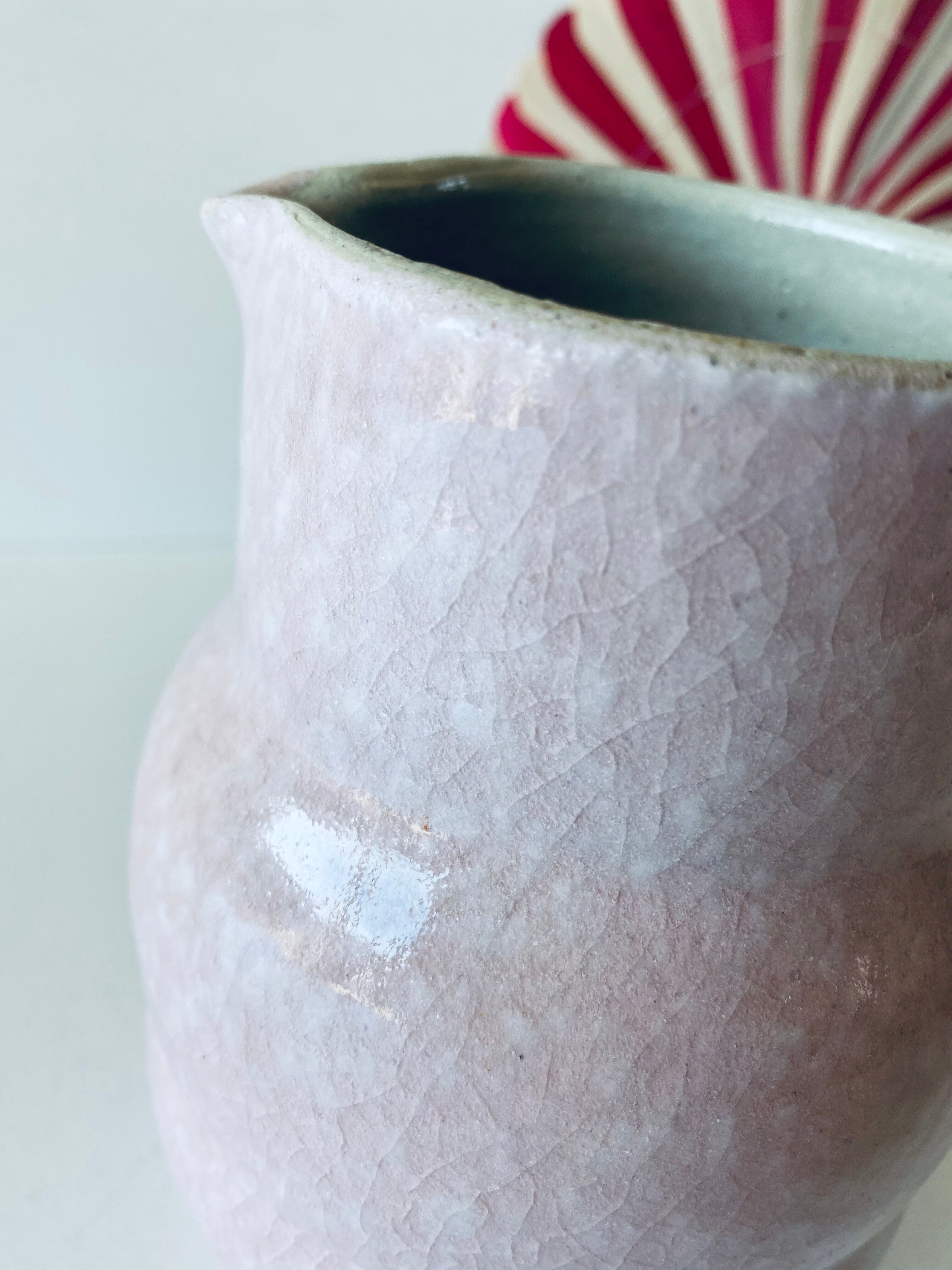 Pitcher in pink glazed ceramic