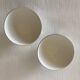 Pair of small faceted bowls with cow illustrations from the 40s and 50s