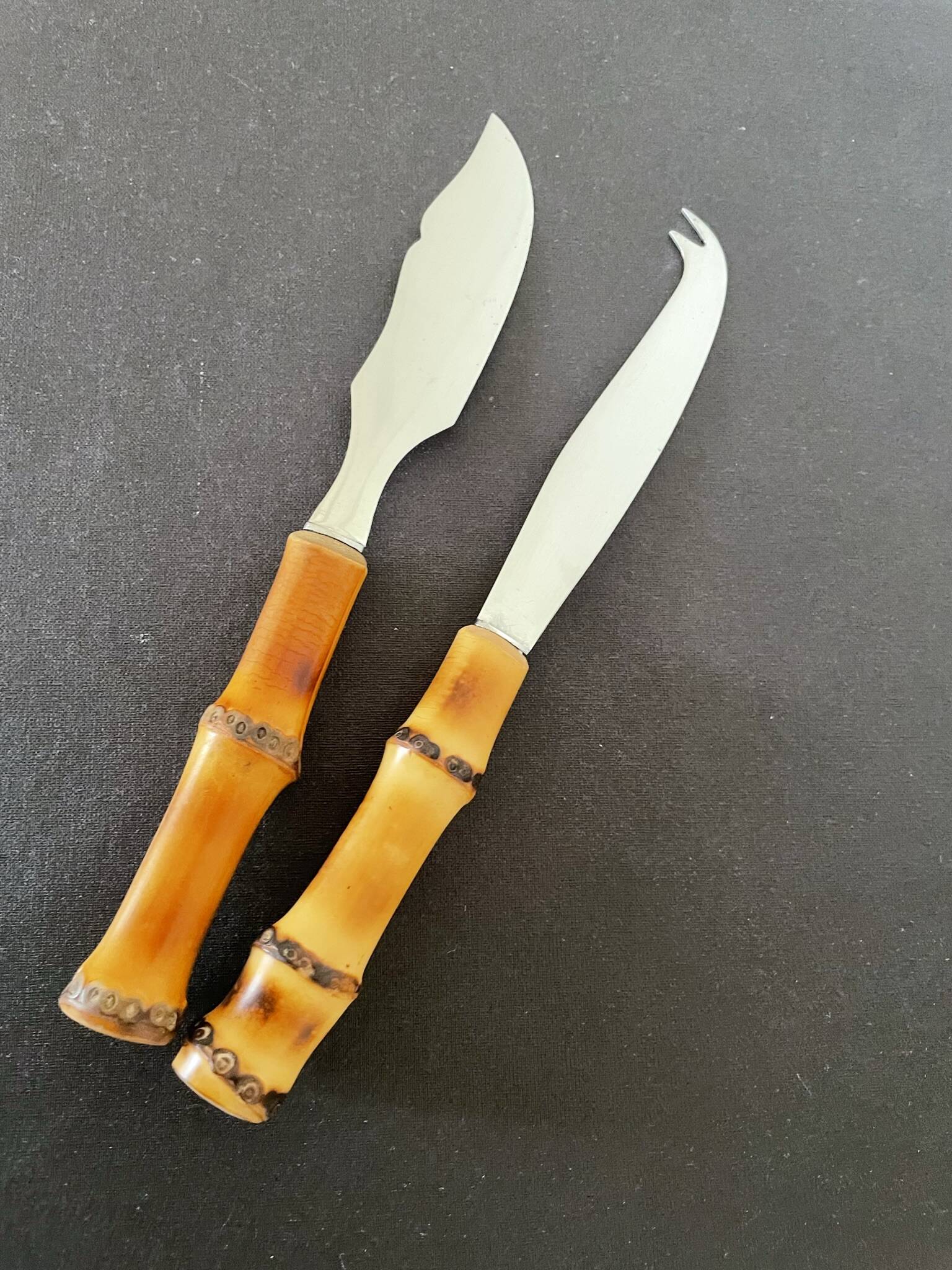 Bamboo handle cheese knives.