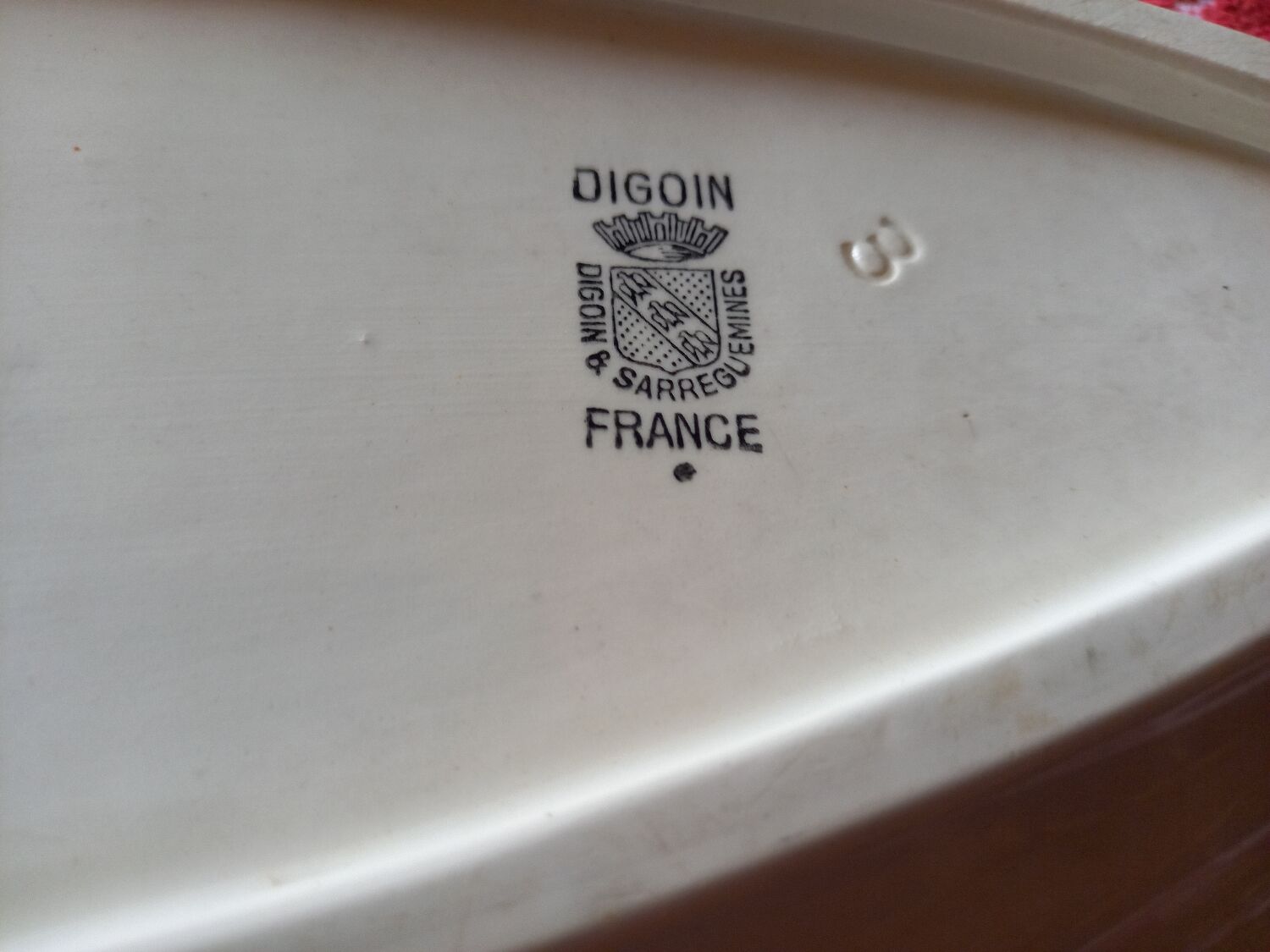 Old white earthenware fish dish