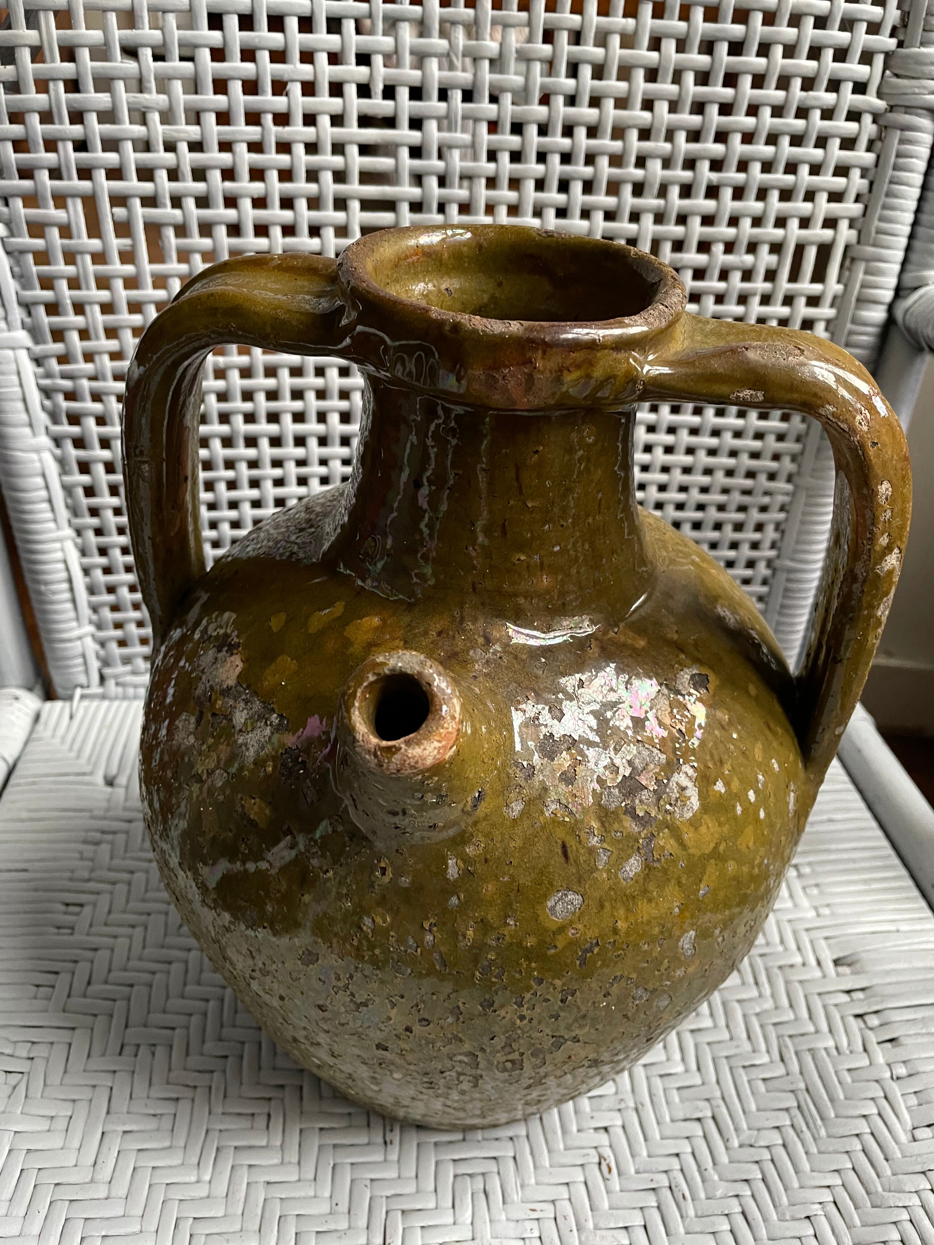 Khaki green glazed terracotta oil jar, 18th-19th century