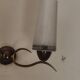 Two-light wall sconce in gilded metal with opaque glass shades, 1950/1960