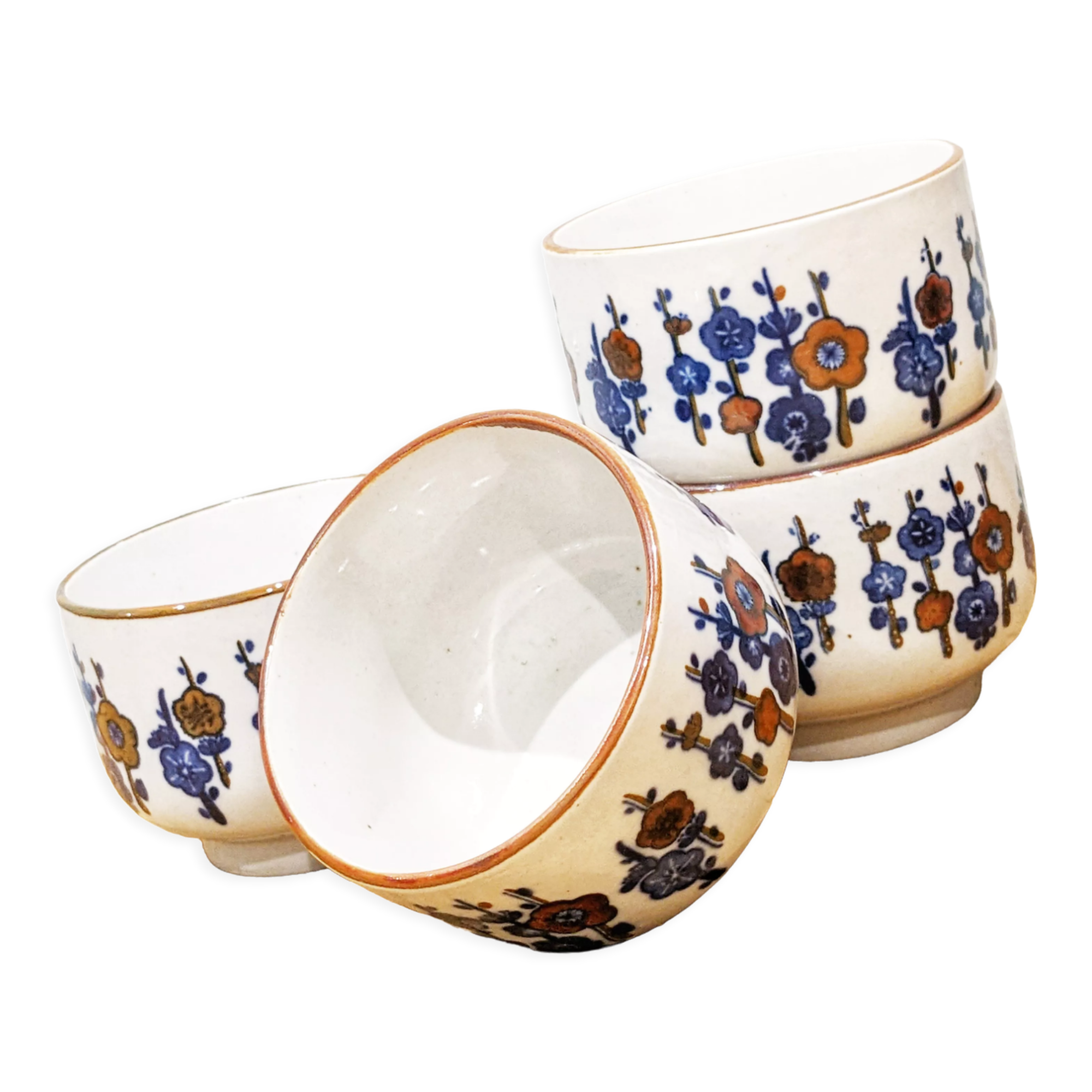 4 tea cups with delicate floral pattern