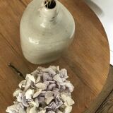 Old light grey ceramic bottle