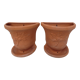 Duo of decorated terracotta wall flowerpots