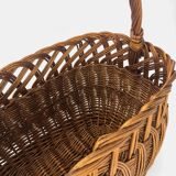 Old woven wicker shopping cart