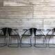 “Armlinda” black leather dining chairs by Arrben Italy