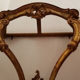 Old gilded wooden console on 2 curved feet