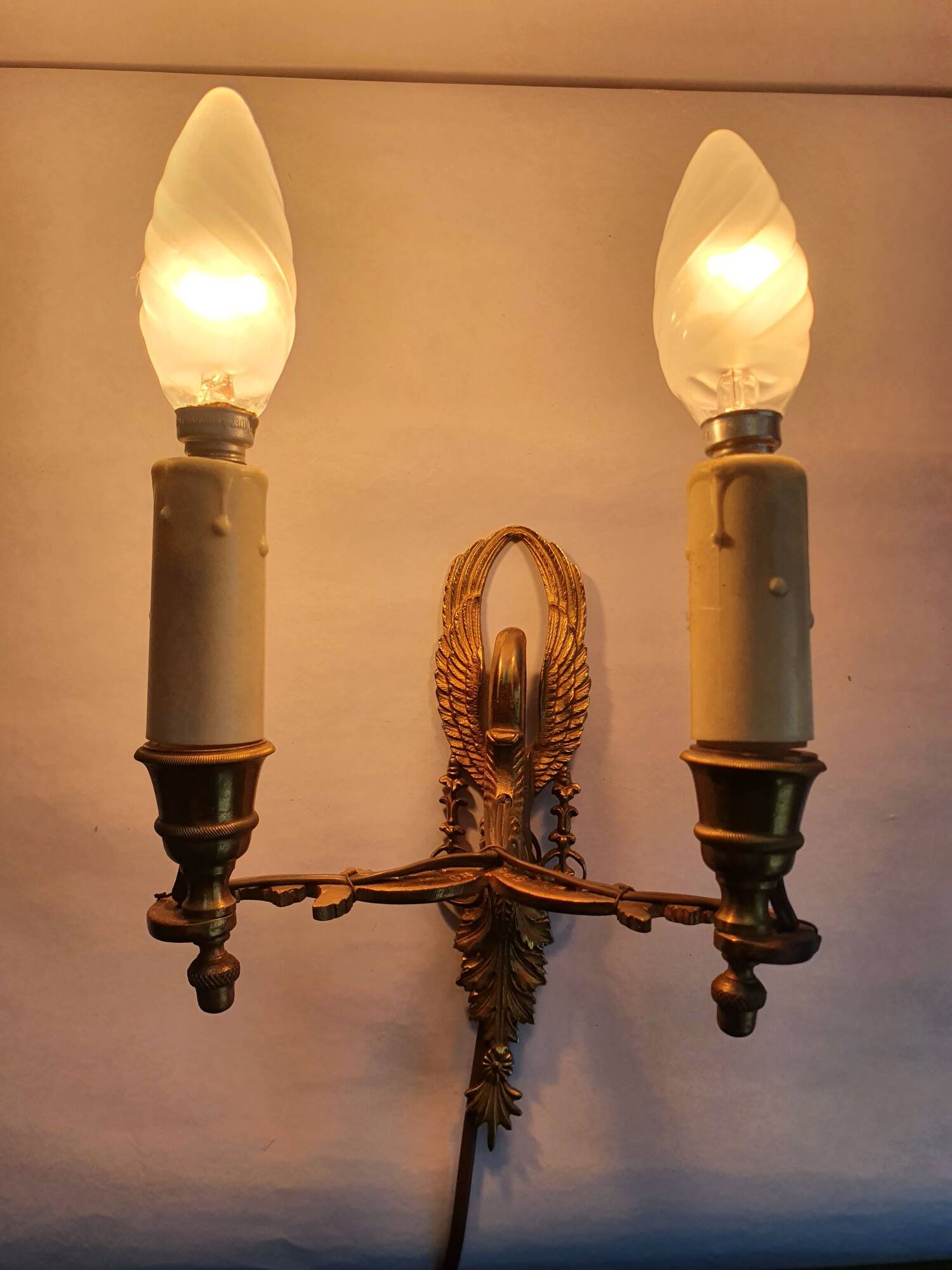 Pair of wall sconces candle holders in Empire style in bronze