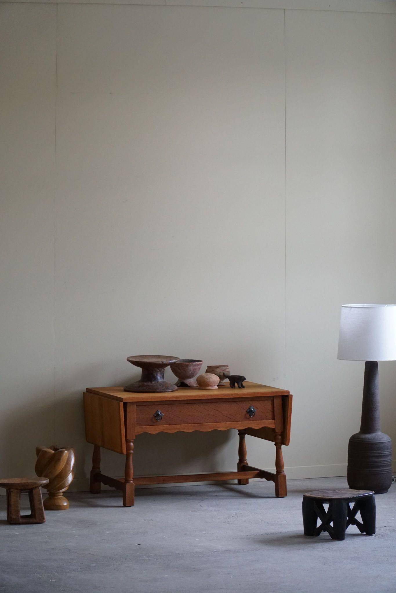 Danish folding table from the mid-century with a drawer in oak, Henning Kjærnulf, 1960s.