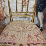 Napoleon III theatre chair in gilded wood