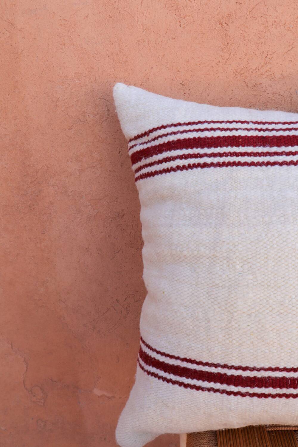 burgundy and white striped cushion in handmade wool