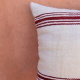burgundy and white striped cushion in handmade wool