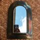 Oriental brass mirror