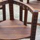 Set of three brutalist tripod armchairs in carved solid oak