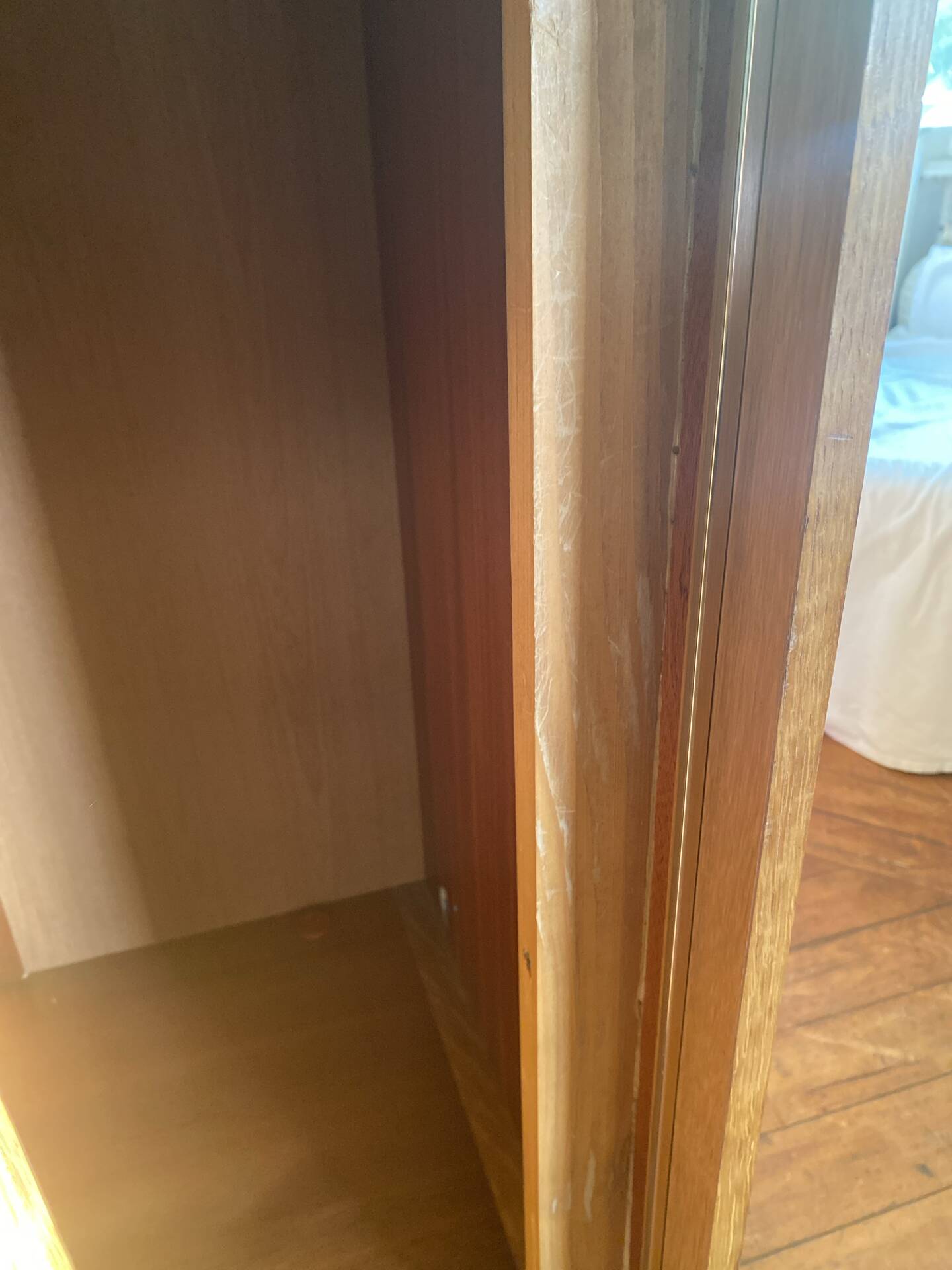 Large vintage Scandinavian wardrobe with two sliding doors.
