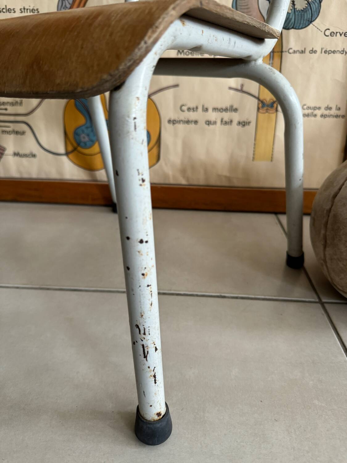 Old wooden and metal children's school chair