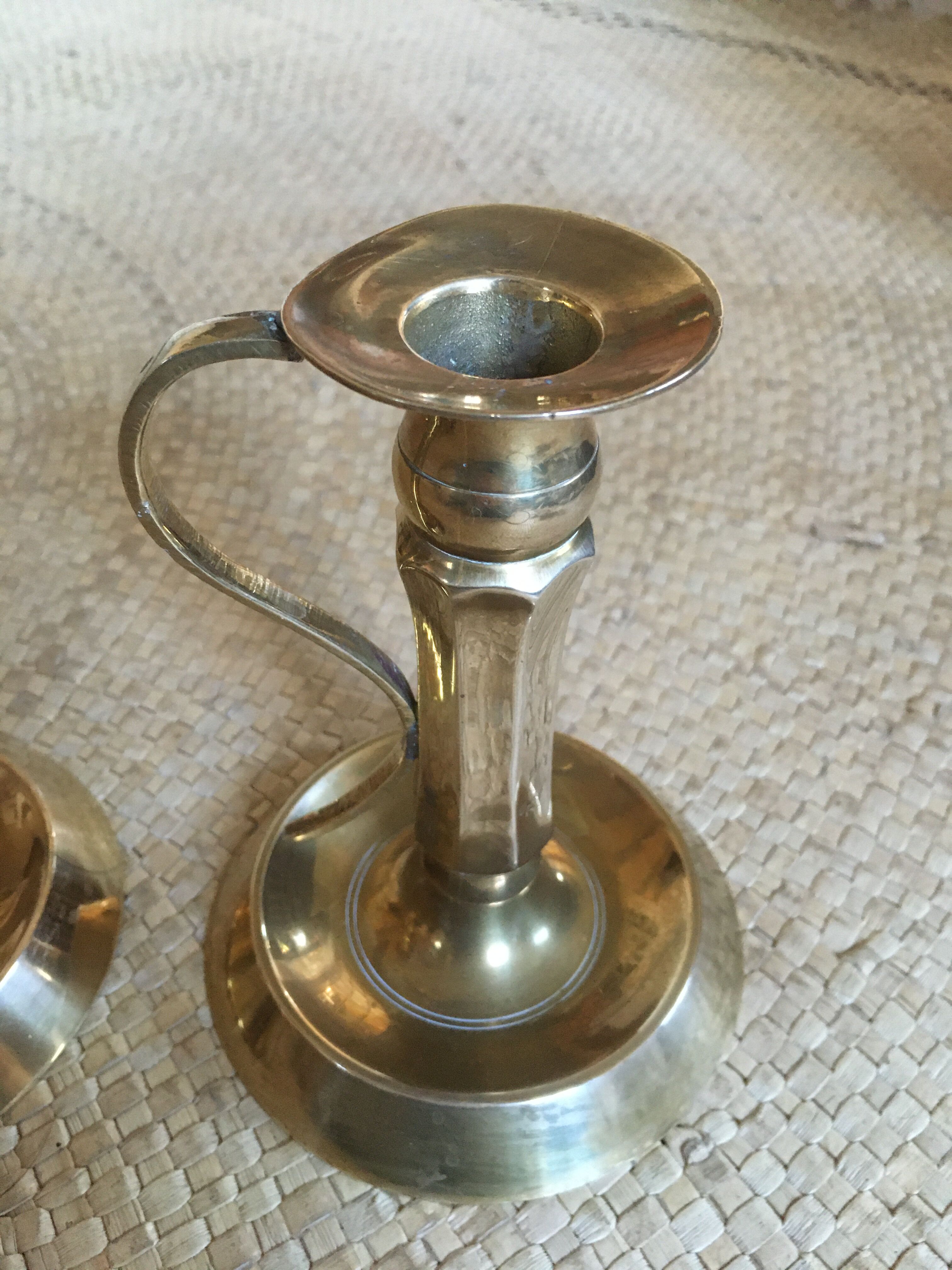 Duo of brass candlesticks