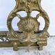 Antique brass fireplace set, bar and andirons, Napoleon I style.