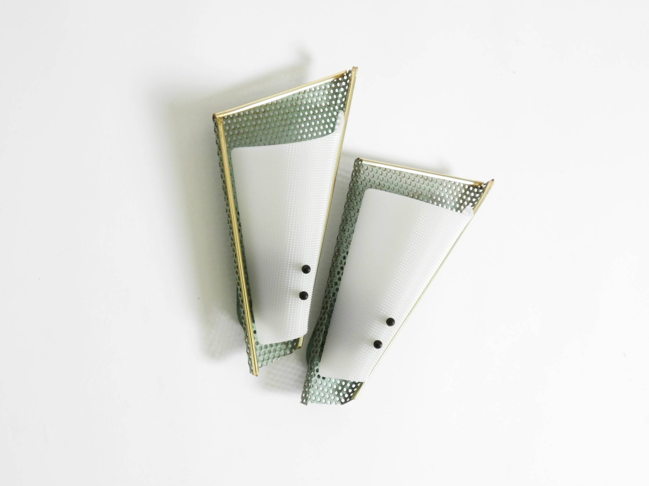 Pair of beautiful mint green Mid Century Modern perforated sheet metal wall