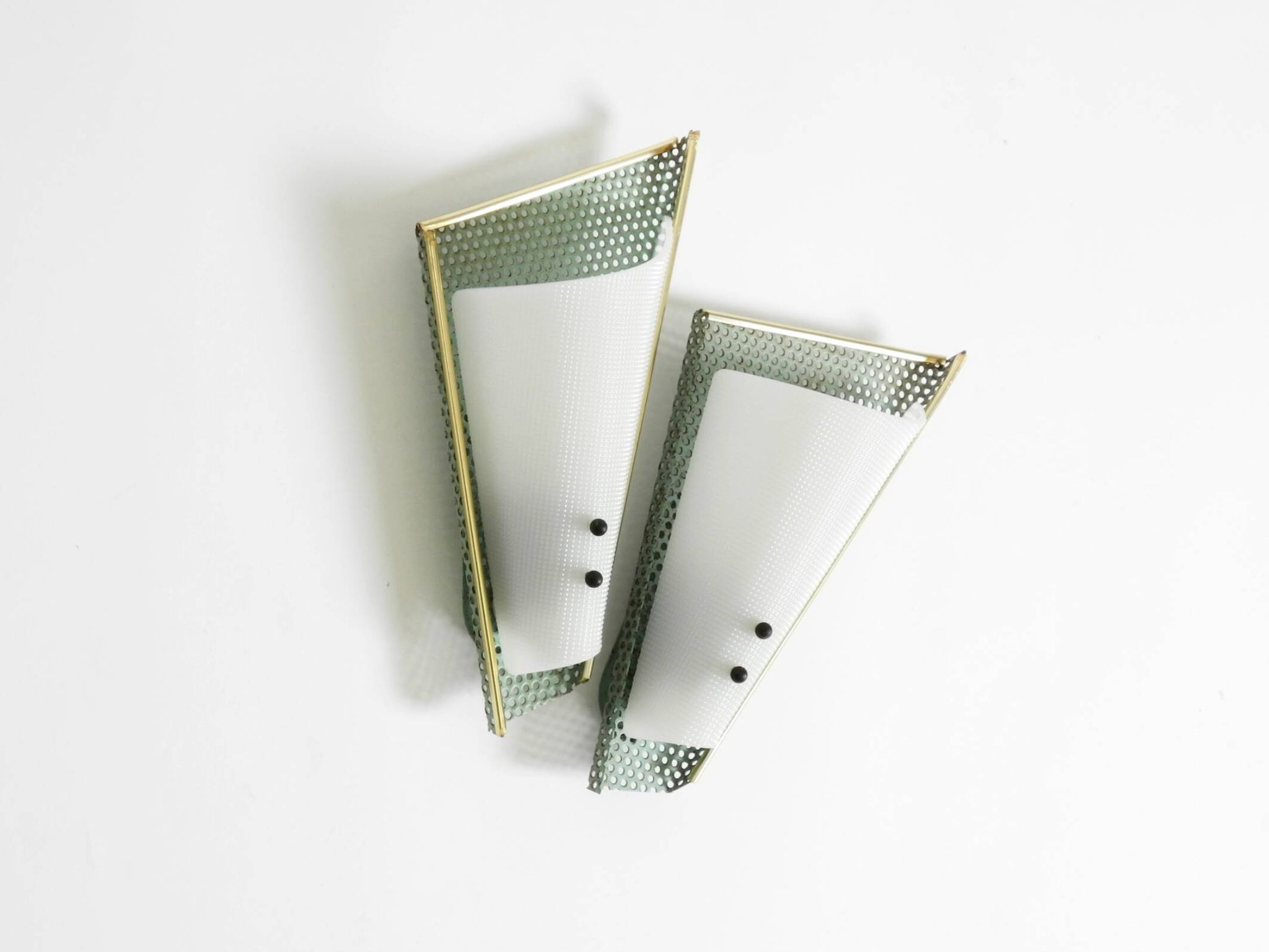 Pair of beautiful mint green Mid Century Modern perforated sheet metal wall