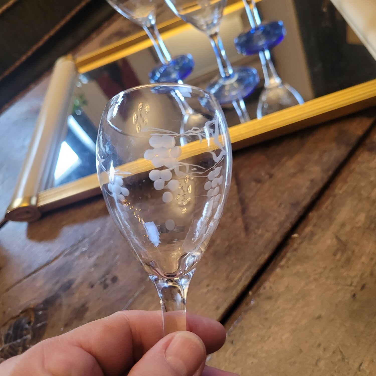 Set of 4 cut glass stemmed glasses from the 50s.