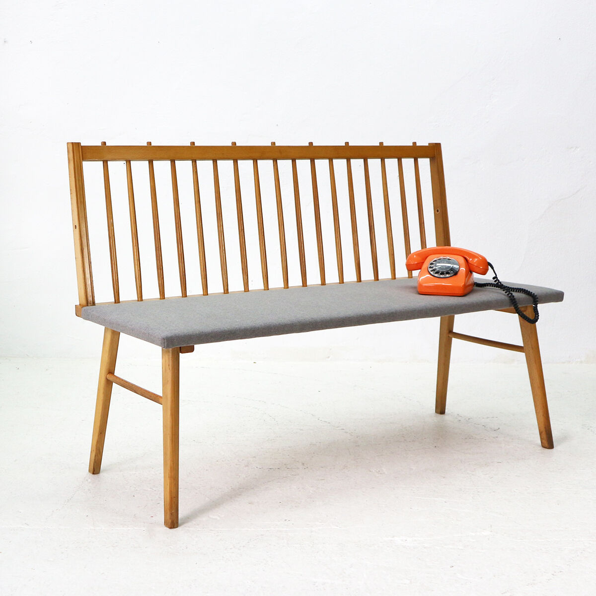 Reupholstered beechwood bench, 1950