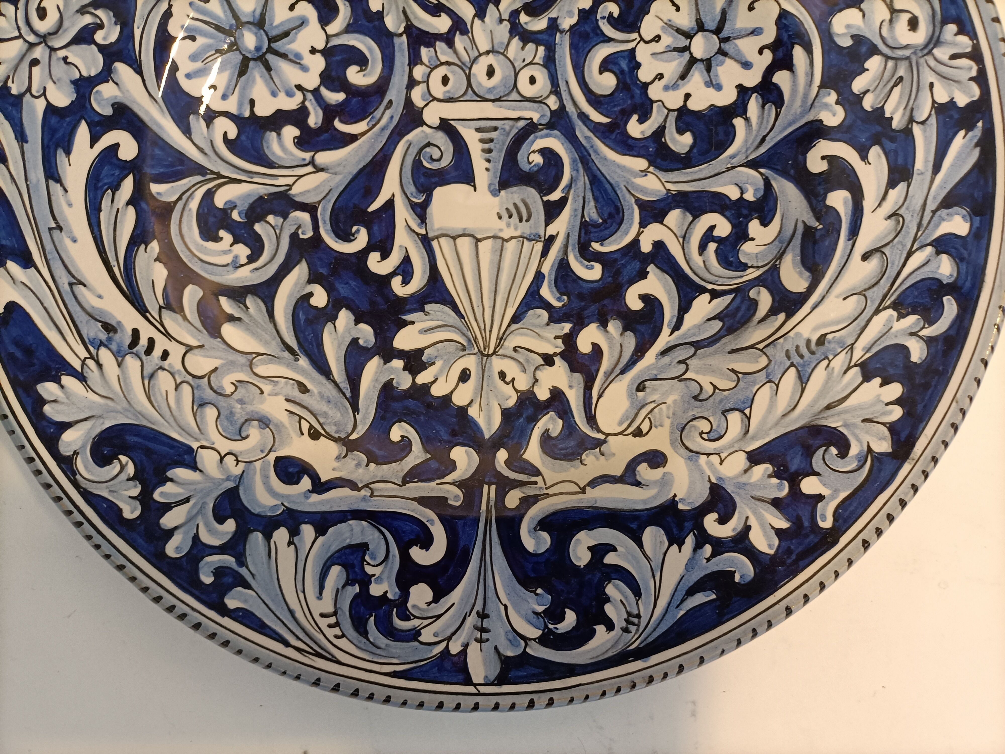 Decorative plate in white blue decoration