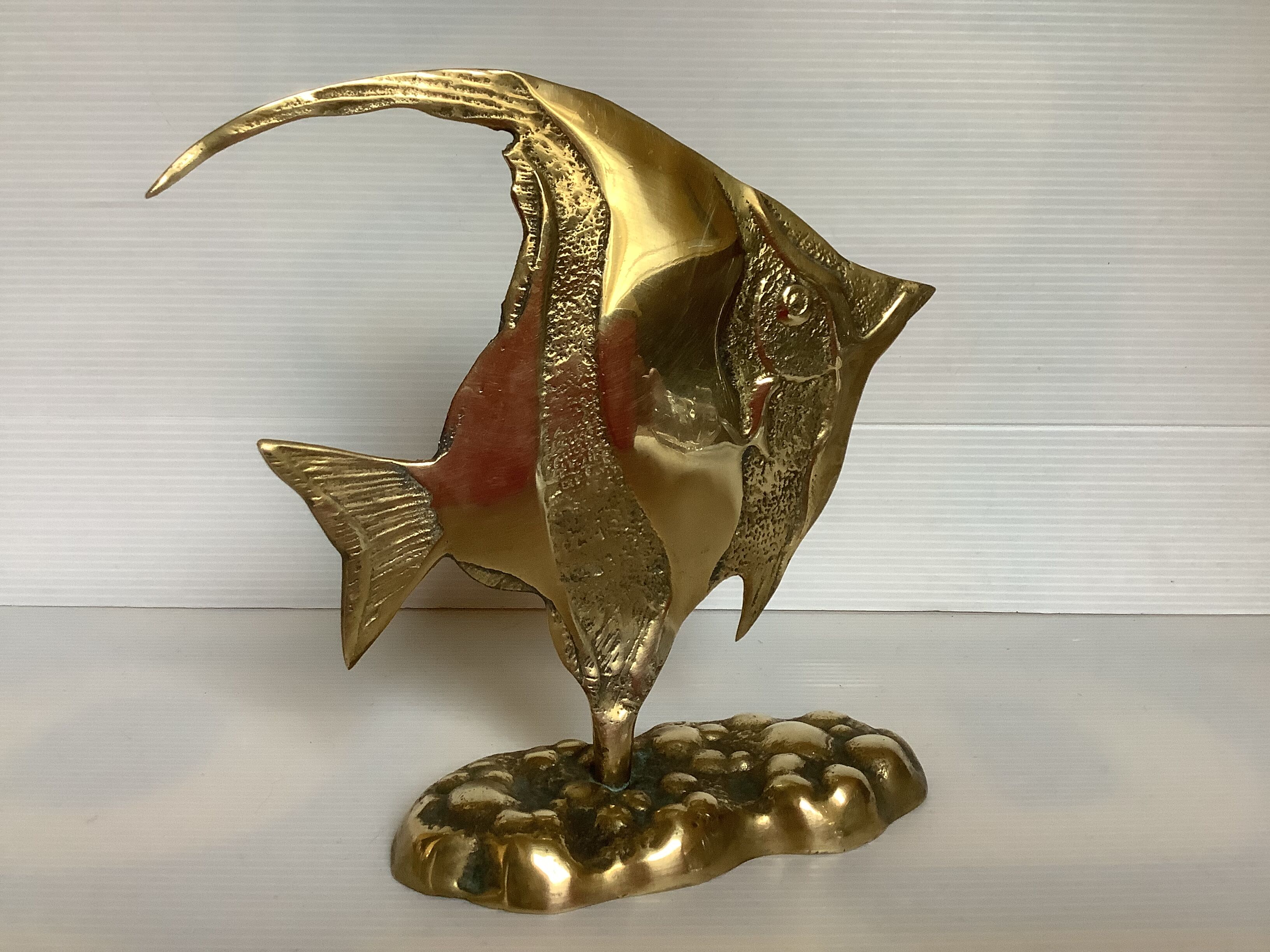 Brass scalar fish