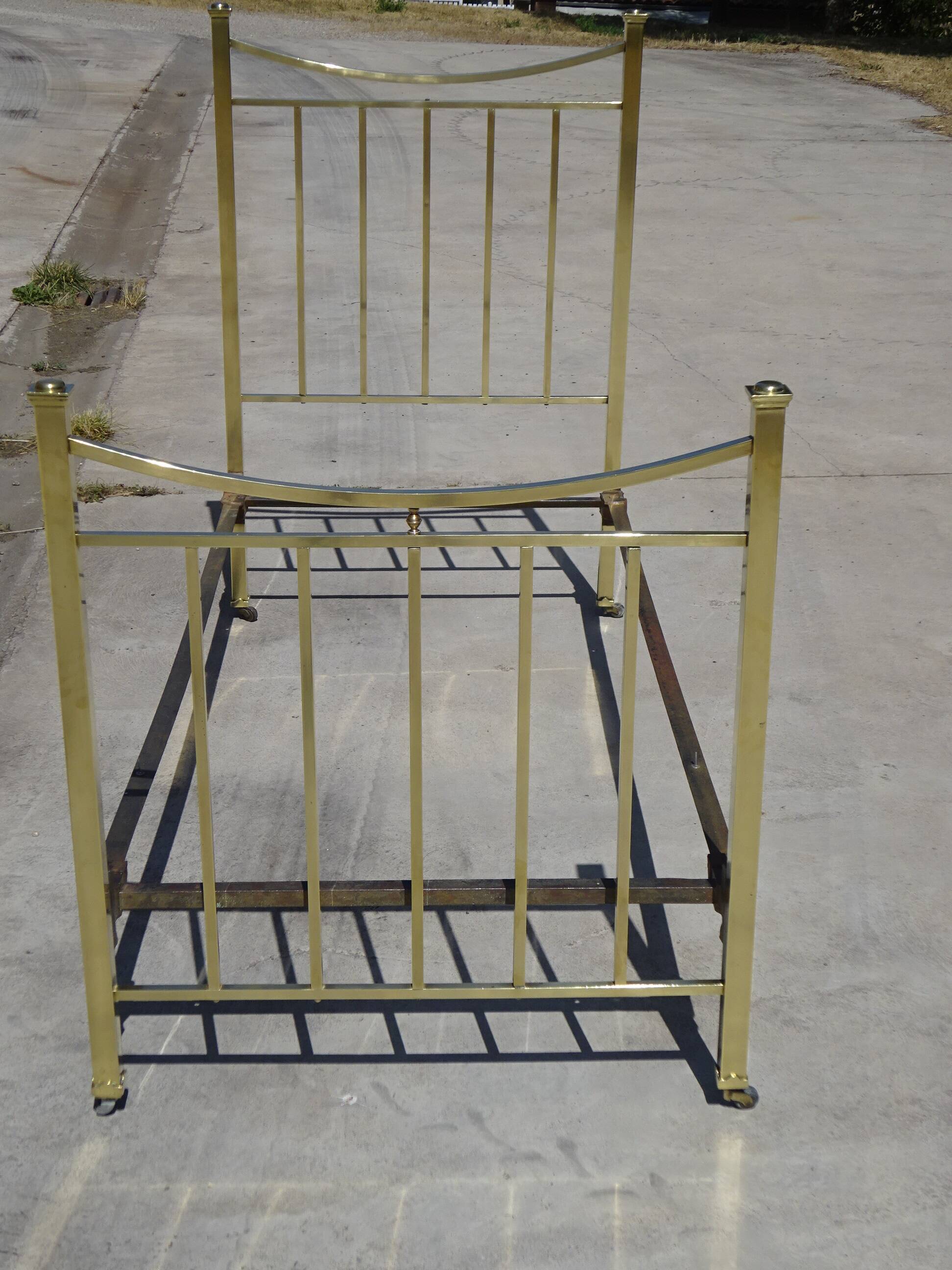 Antique gold-plated brass bed for one person.