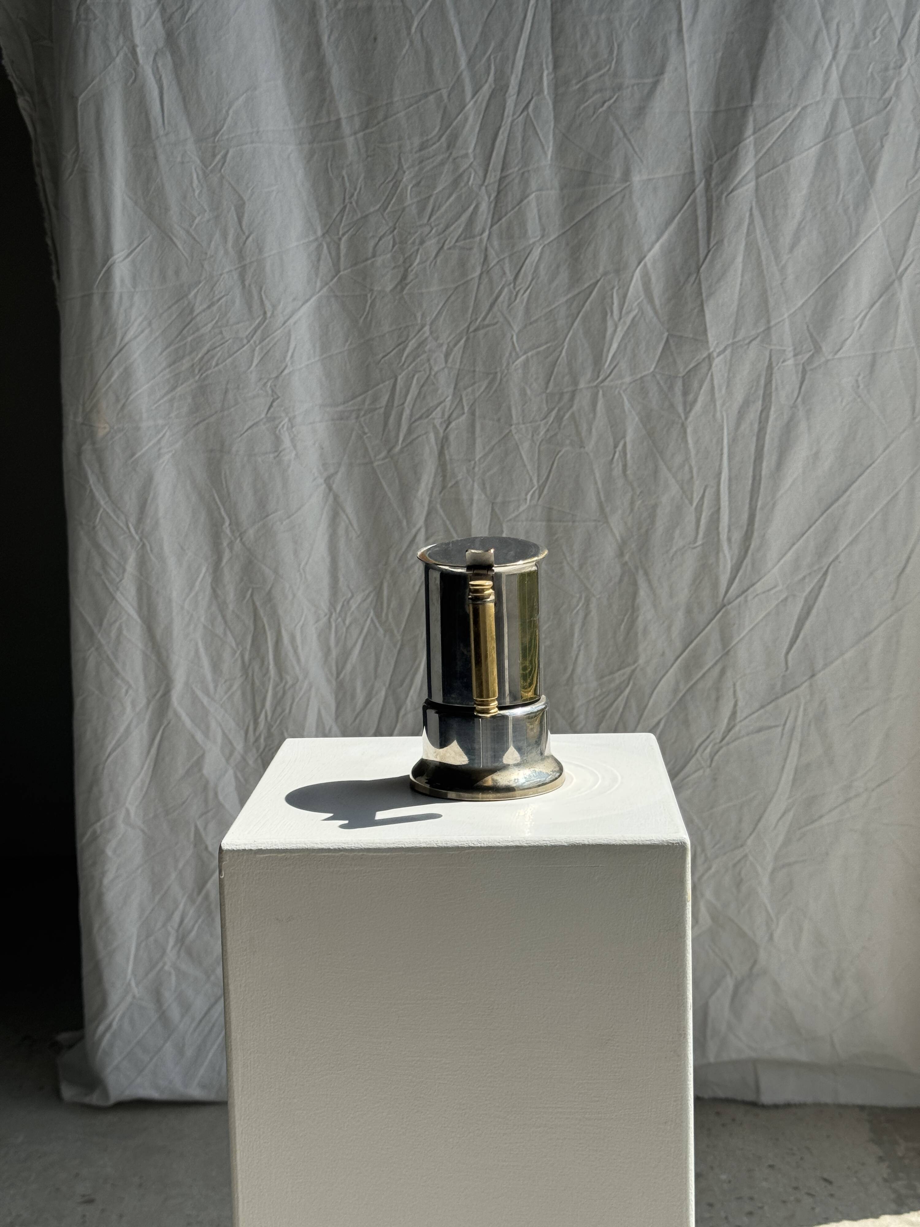 Small silver and gold Italian coffee maker Alpu-F Puppieni in stainless steel