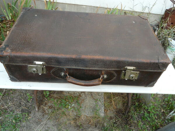 Valise en cuir marron intérieur tissu