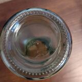 Old green milk bottle