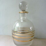 Pair of glass whiskey decanters with gold edging