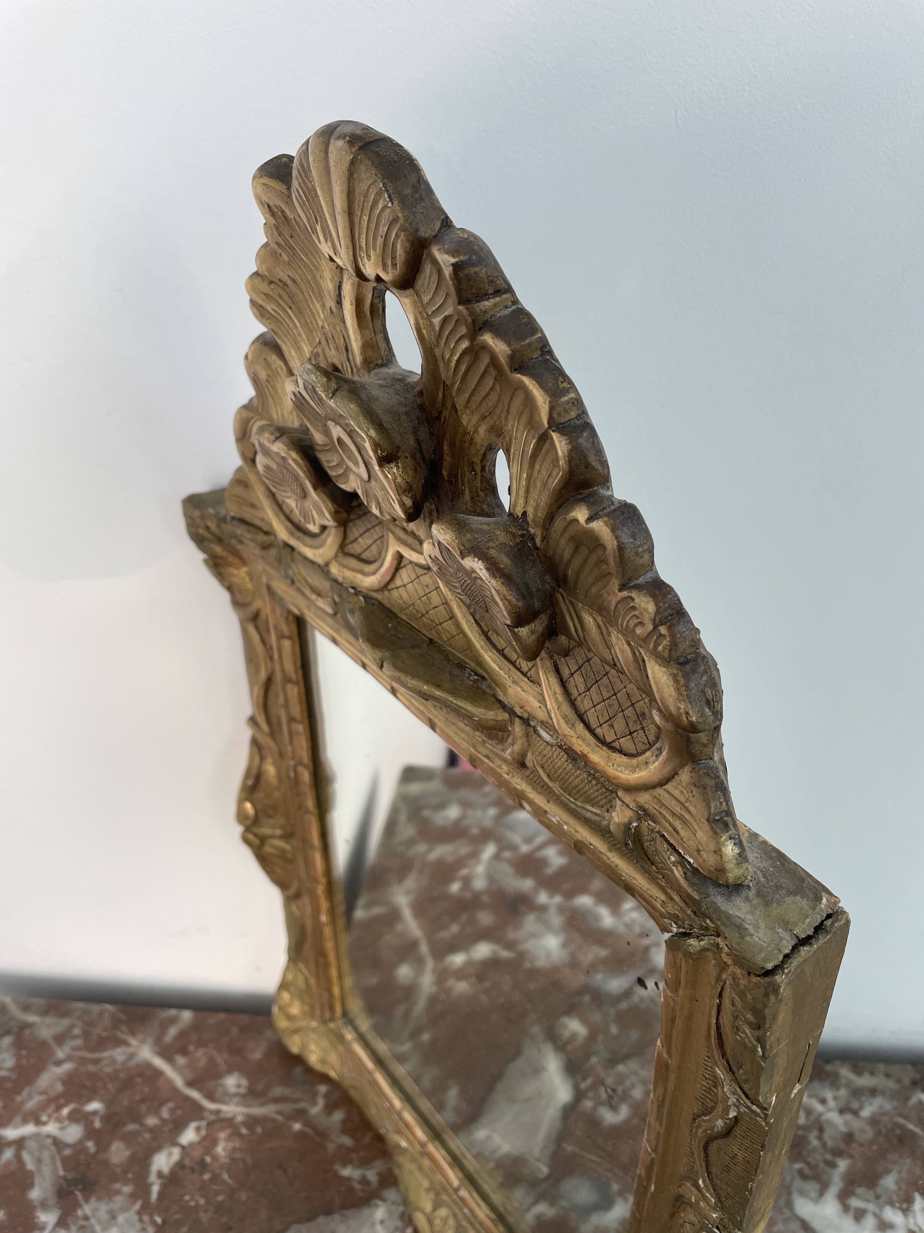 18th century mirror, Louis XVI period, gilded carved wood