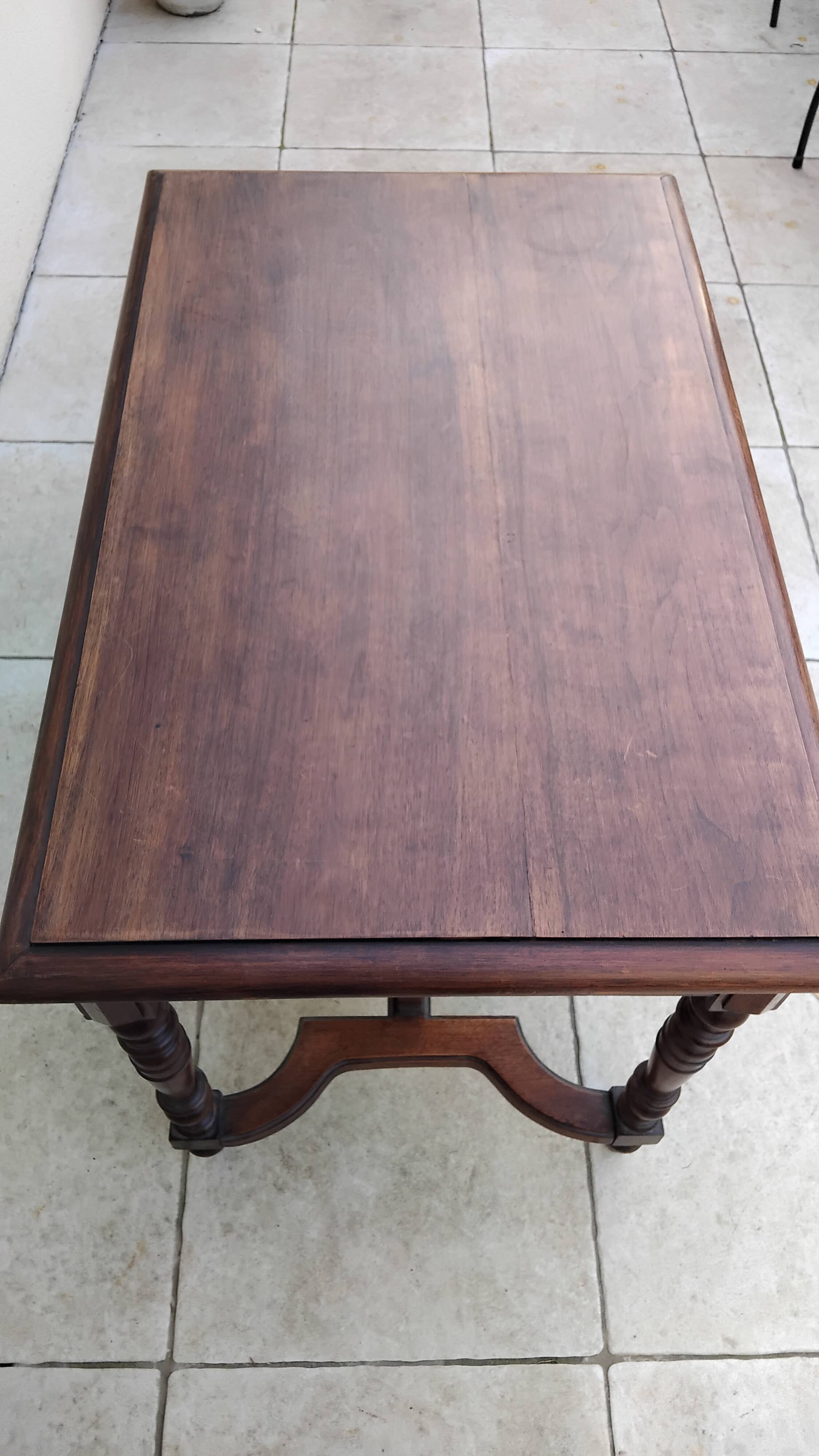 Antique desk or small table in solid carved wood