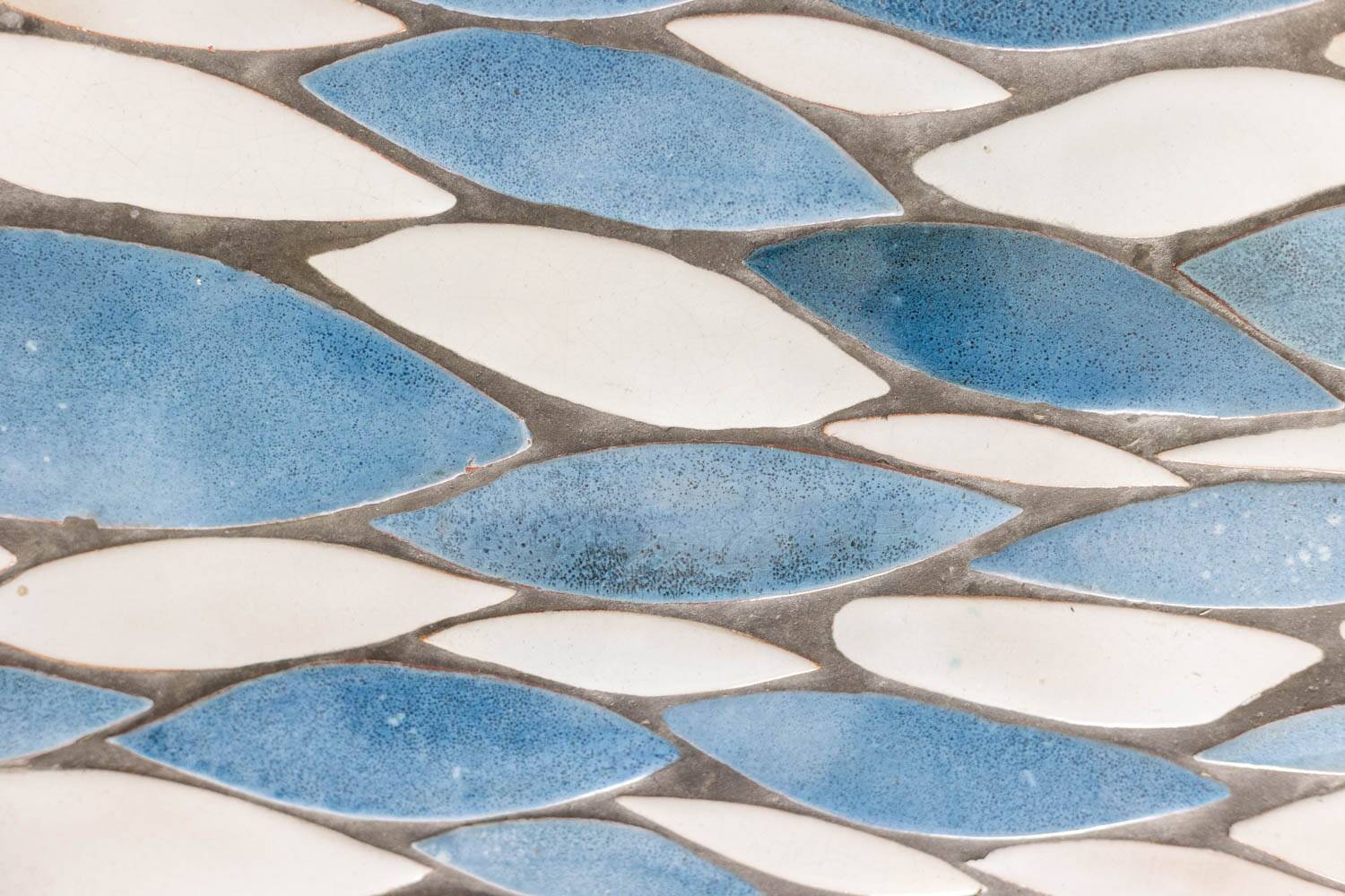 Polished metal and ceramic dining table. 1970s.