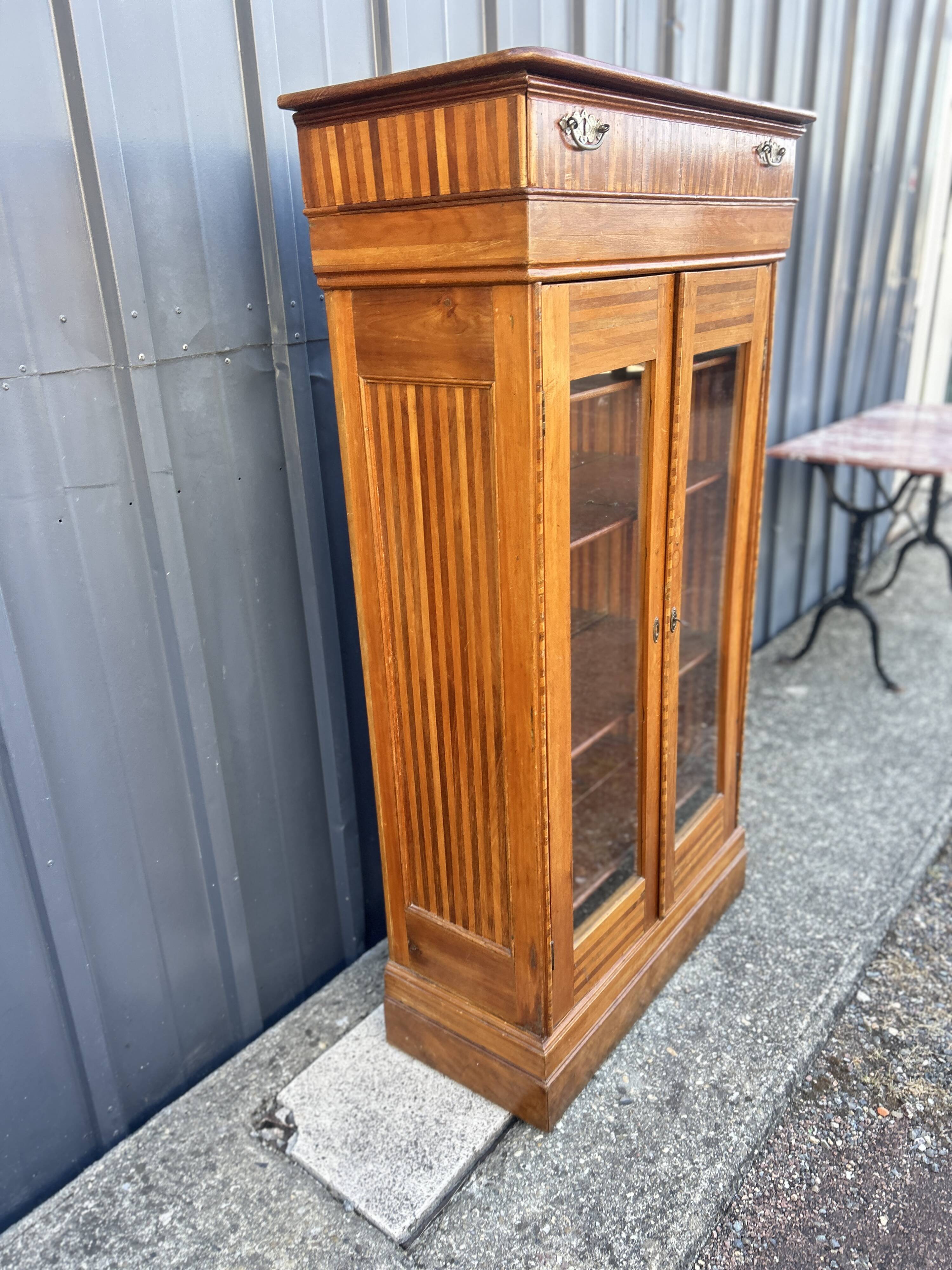 Two-door mahogany display cabinet